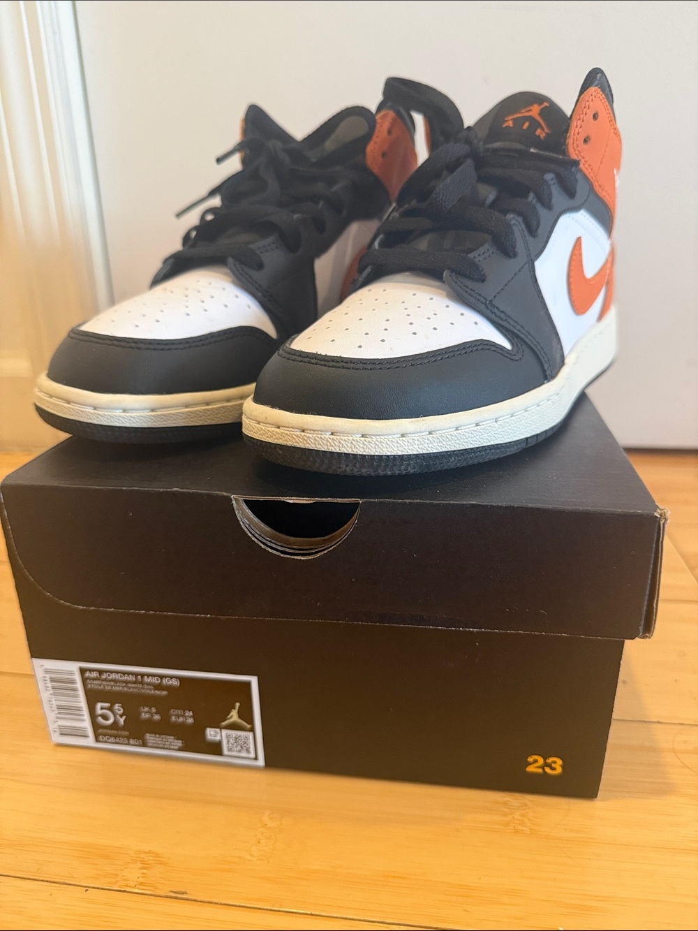 Jordan 1 black white and orange size 5.5y